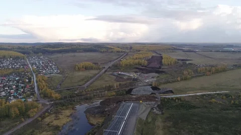 Highway. The asphalted section and the road section under construction Stock Footage 140960126