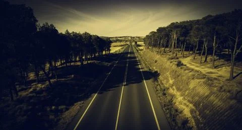 Highway between mountains Stock Photos