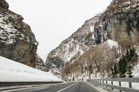 Highway between steep rocks. Stock Photos