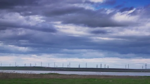 Highway beyond the field and dramatic thunder clouds Stock Footage 107346967