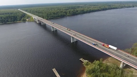 Highway on bridge over river, aerial view Stock Footage