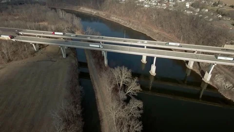 Highway bridge over river and canal in shadow Stock Footage 72920320