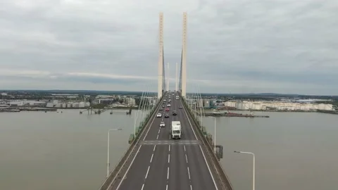 Highway bridge over wide Thames river, cars driving against Stock Footage 161122120