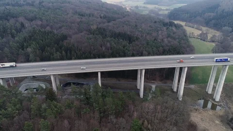 Highway bridge through forest area Stock-Footage 104780999