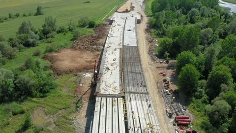 Highway bridge under construction. Infrastructure at a motorway road Stock Footage 248482865