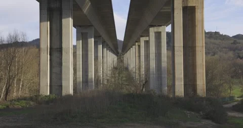 Highway bridge underpass structure with ... | Stock Video | Pond5