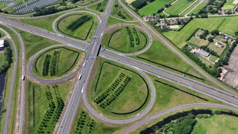 Highway cloverleaf junction with transport infrastructure in Europe Stock Footage 336948928