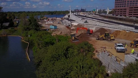 HIGHWAY CONSTRUCTION AERIAL INTERSTATE I-4 ORLANDO BULLDOZERS DIG Stock Footage 126866848