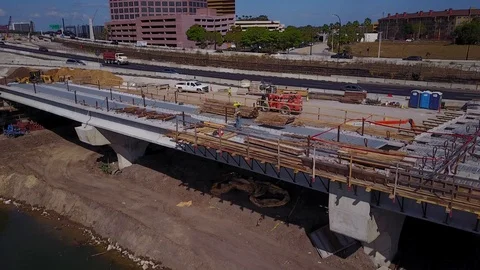 HIGHWAY CONSTRUCTION AERIAL INTERSTATE I-4 ORLANDO WORKERS W TRAFFIC Stock Footage 126876368