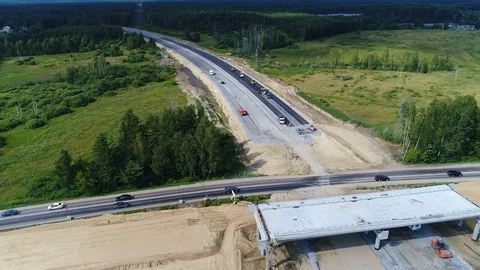 Highway construction. Development asphalt transport road. Top Aerial View. Stock Footage 129101965