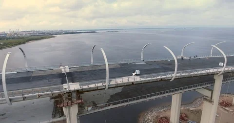 Highway construction. A long highway bridge crossing the gulf. Aerial drone foot Stock Footage 70078558