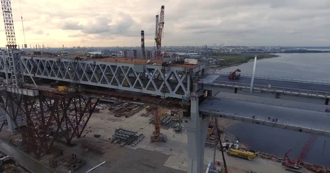 Highway construction. A long highway bridge crossing the gulf. Aerial drone foot Stock Footage 70078693