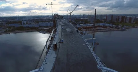 Highway construction. A long highway bridge crossing the gulf. Aerial drone foot Stock Footage 70079787