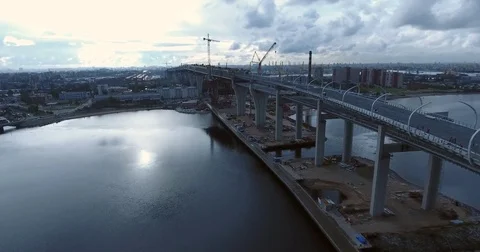 Highway construction. A long highway bridge crossing the gulf. Aerial drone foot Stock Footage 70120522