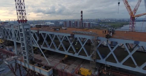 Highway construction. A long highway bridge crossing the gulf. Aerial drone foot Video stock 70120757