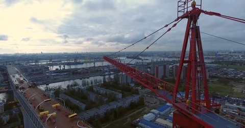 Highway construction. A long highway bridge crossing the gulf. Aerial drone foot Video stock 70121232