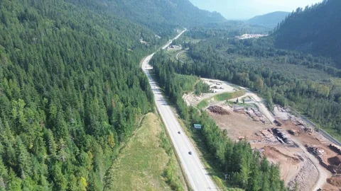 Highway Construction in a Mountain Valley Stock Footage 318817844