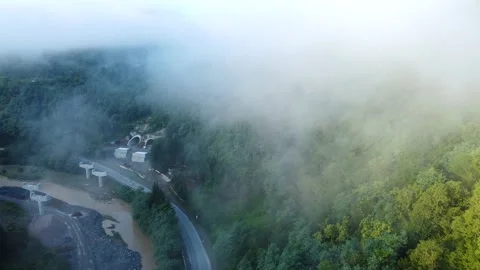 Highway construction view from the clouds in the mountains Stock-Footage 168573493