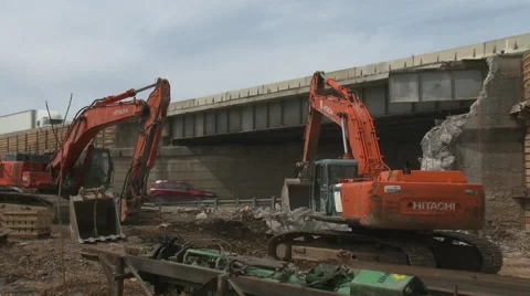 Highway construction with working back hoe Stock Footage 49893808