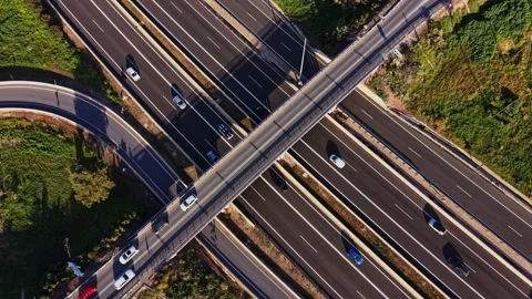 Highway crossing in Spain with multiple lanes and vehicles driving Stock Footage 327648657