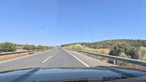 Highway from the driver seat through the windshield Stock Footage 297081996