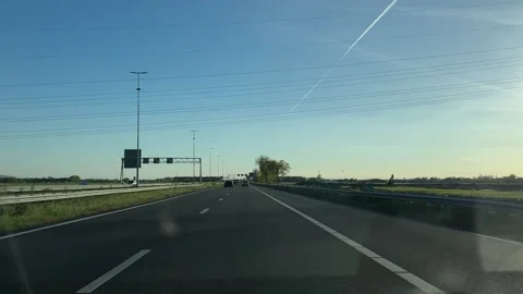 Highway driving driving on a highway, in open road with clear sky and distant Stock-Footage 342752230