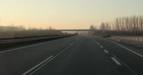 Highway driving view at dawn Stock Footage 327687199