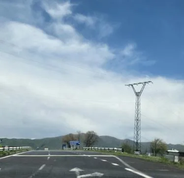 Highway With Electrical Transmission Tower Stock Photos