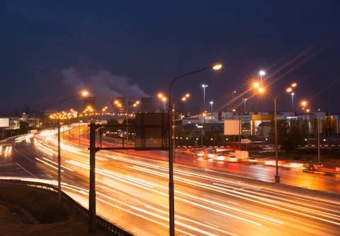 Highway at evening Stock Photos