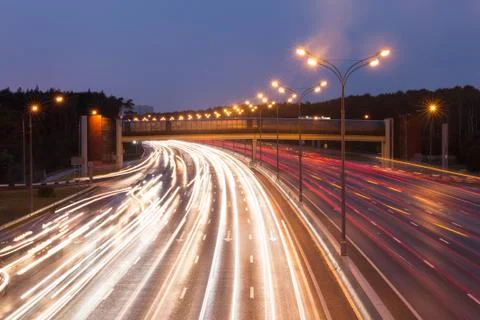 Highway at evening Stock Photos