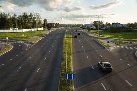 Highway in the evening view from the bridge down. Evening city, motorway Stock Photos