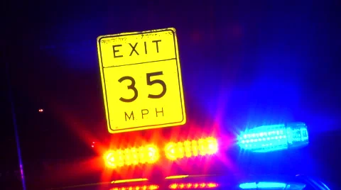 Highway exit 35mph sign with emergency lights. Video stock 45499570