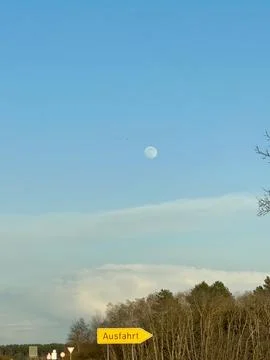Highway Exit with Moon Overhead Stock Photos