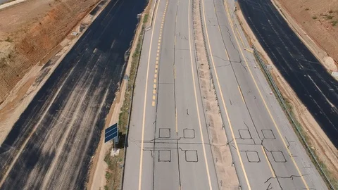 Highway extension works. Construction of additional lanes on highway, drone view Stock Footage 115073111