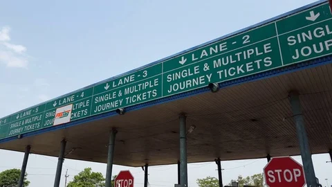Highway freeway toll gate checkpoint, single multiple journey tickets, India Stock Footage 72342129