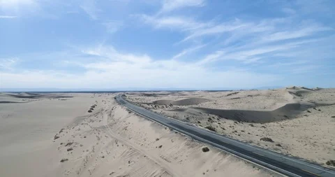 Highway going through sand dunes at North Algodones dunes drone aerial 4K Stock Footage 111309654