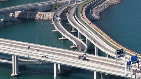 Highway interchange bridge overpass traffic crossing water Stock-Footage 333674599