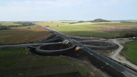 Highway interchange construction progressing over time. Clip Stock Footage 312075318