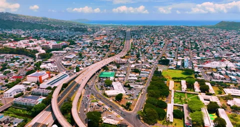 Highway interchange cutting through Honolulu residential district, Hawaii Stock Footage 337460638