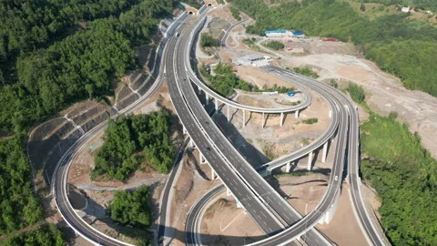 Highway interchange with off ramp on the new freeway in Montenegro Stock Footage 212638969