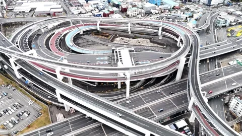 Highway Interchange | Traffic Circulation - 4K Aerial Video Stock Footage 329056360