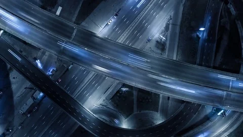 Highway interchange with traffic . UHD, 4K  . Aerial top down view Stock Footage 80351478