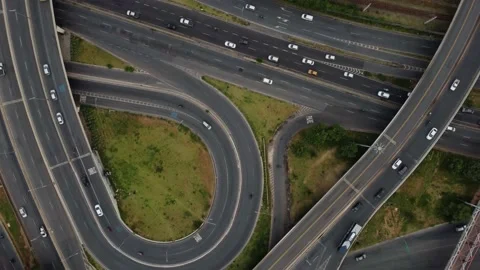 Highway interchange with train tracks and BRT exclusive lanes in Latin America Stock-Footage 153233827