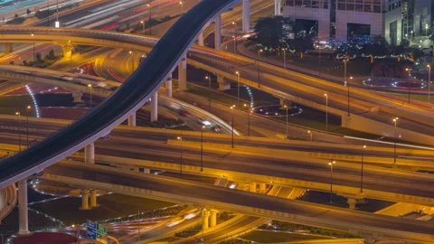 Highway intersection and overpass of Dubai downtown aerial night timelapse. Stock Footage 211671610