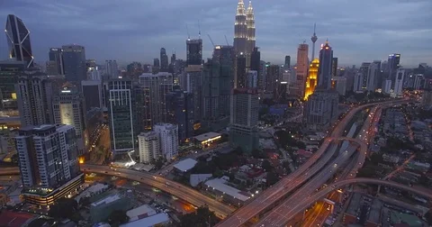 Highway Intersection in Kuala Lumpur City Center, Aerial Tilt Shot Stock Footage 80490129