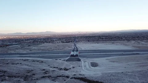 Highway intersection on outskirts of town Stock Footage 81574989