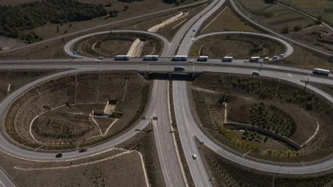 Highway Intersection Roundabout Trucks Passing Aerial View 2 Stock Footage 123090972