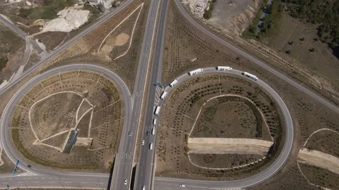 Highway Intersection Roundabout Trucks Passing Aerial View 5 Stock Footage 123091191