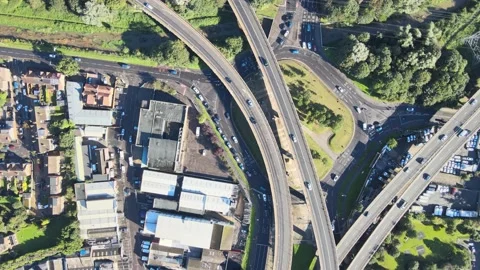 Highway intersection in town, traffic on roads in neighbourhood Vídeos de archivo 164817436