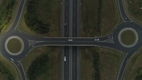 Highway junction aerial with roundabout Stock Footage 204814946
